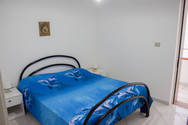 Appartamento in affitto a Lido Marini: camera da letto matrimoniale 1
