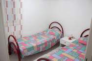 Appartamento in affitto a Lido Marini: camera da letto con due letti singoli 1