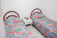Appartamento in affitto a Lido Marini: camera da letto con due letti singoli 2